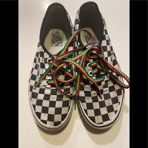 Checkered vans with bad brains laces.
